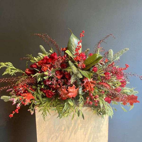 Centro flores rojas Navidad